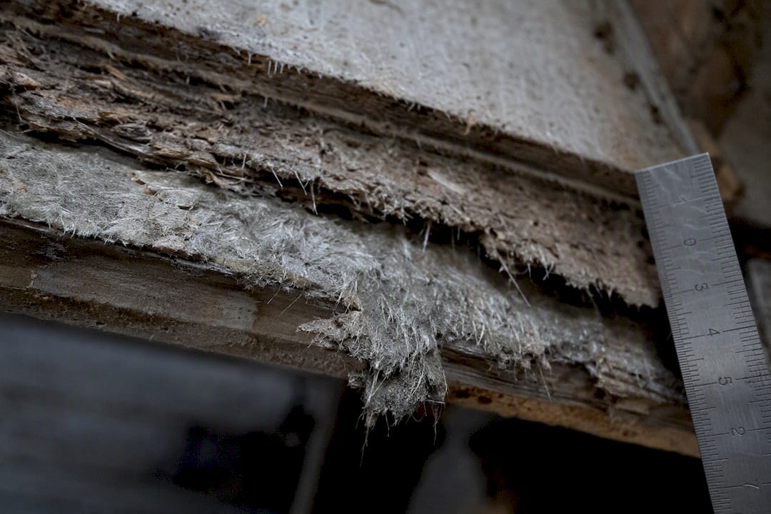 Asbestos damaged material close view