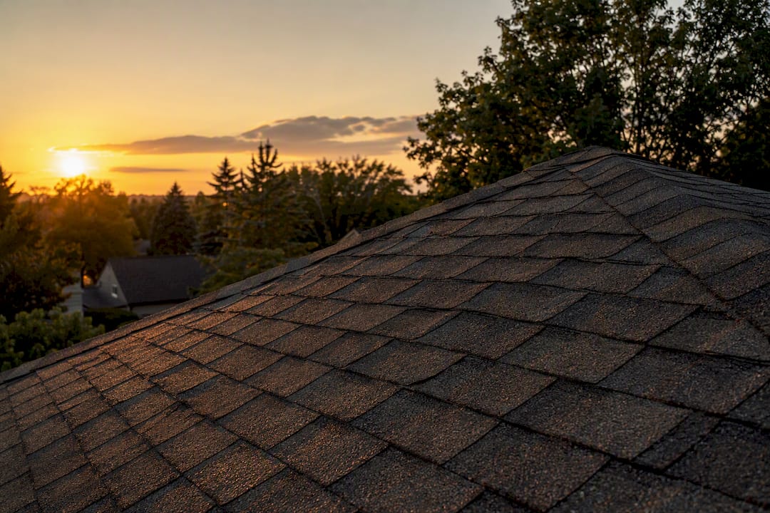 Weathered asbestos roofing shingles close-up