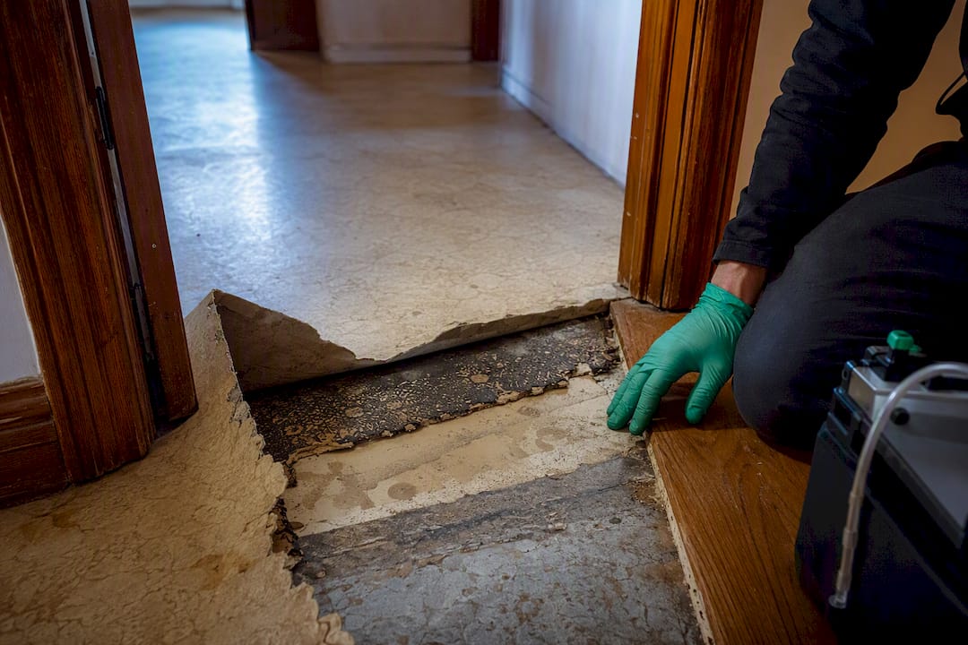 Older home flooring exposing hidden building layers