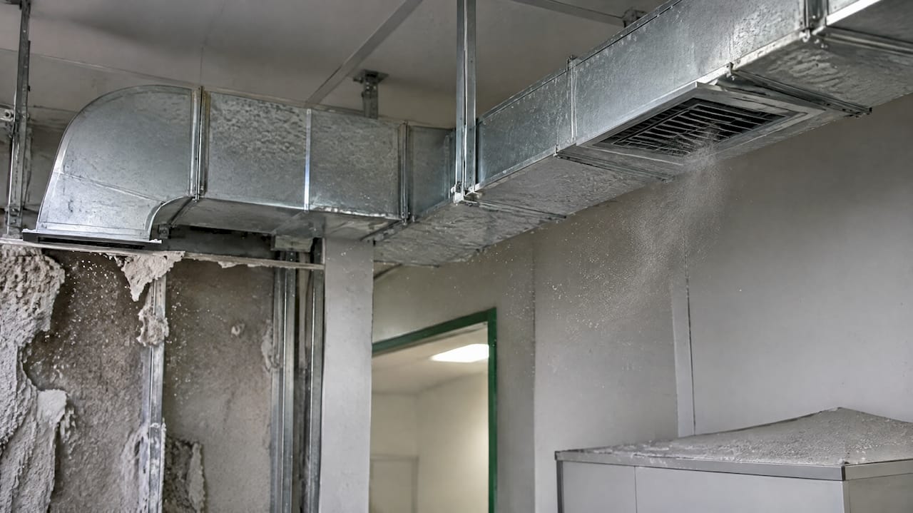 Illustration of asbestos fibres spreading through HVAC
